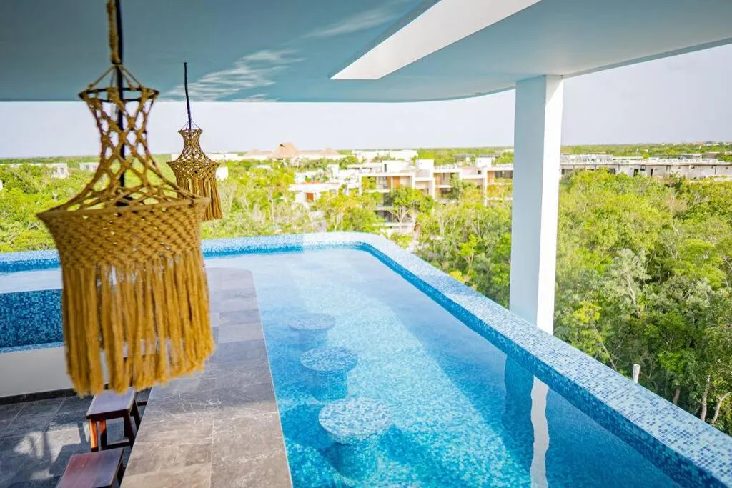 Image of 2-level apartment in Aldea Zama with private splash pool.
