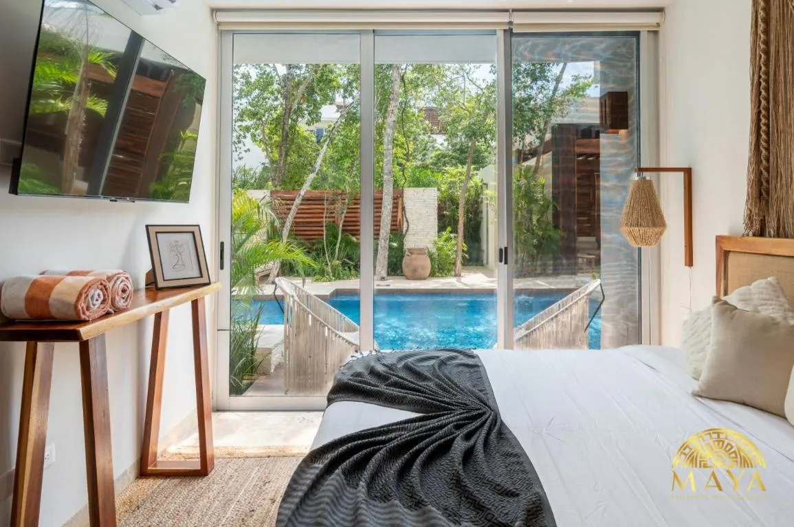 Image of NHOA 107A Lux 2BR Condo Pool access in Aldea Zama