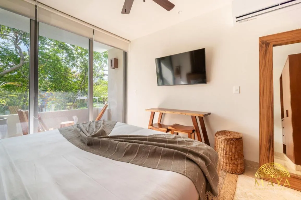 Image of NHOA 209B Lux 1BR Condo Pool View in Aldea Zama